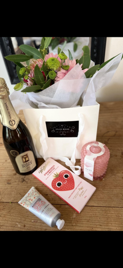Mothers Day giftbag - Beautiful Flourish gift bag filled with flowers, chocolates, bubbles, scented candle and other goodies depending on the size of the bag you order - order today!