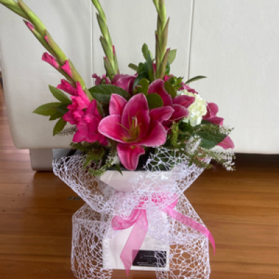 Bouquet in a vox box - Beautiful bouquet in a water filled vox box - perfect for hospitals or sympathy bouquets where a vase is needed