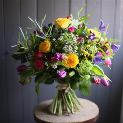 Spring bouquet - A gorgeous selection of spring flowers loosely arranged in a beautiful country styled bouquet just awaiting a vase